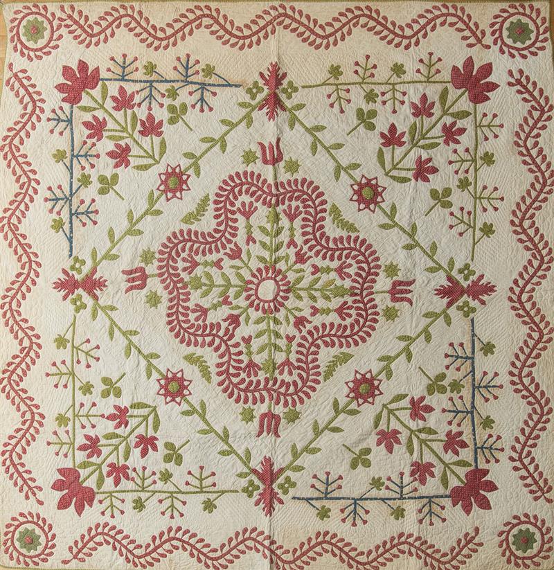 Appraisal: THREE AMERICAN APPLIED COTTON QUILTS The first decorated with fruiting