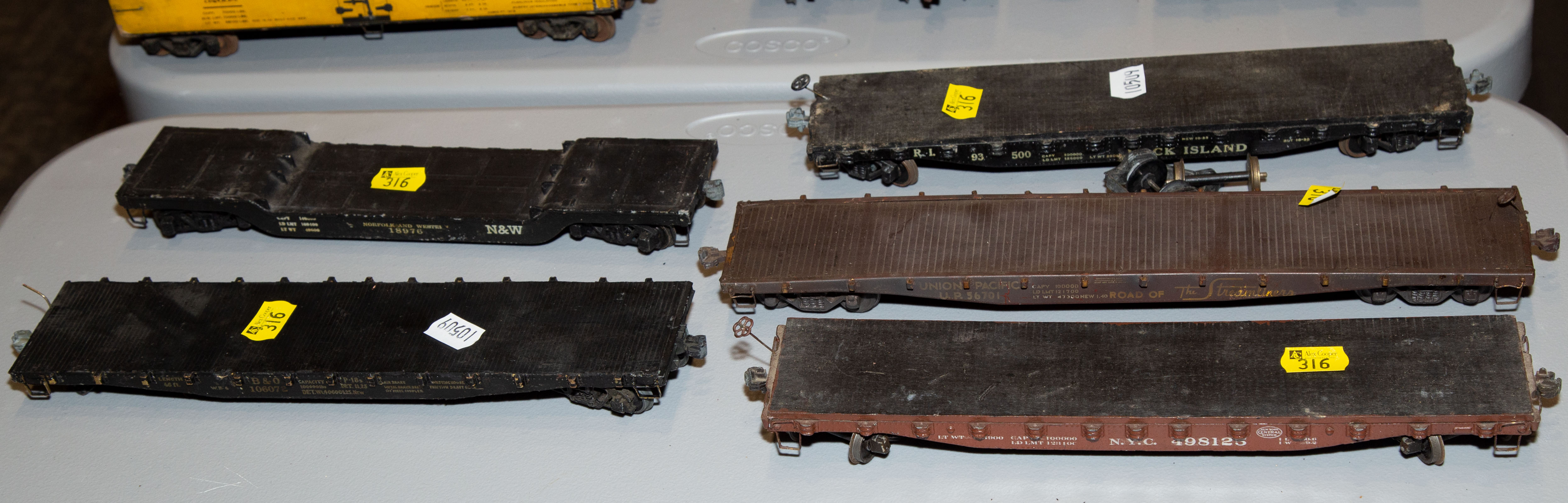 Appraisal: FIVE PAINTED METAL WOOD SCALE FLAT CARS Circa - s