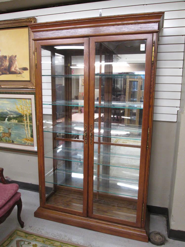 Appraisal: MODERN OAK AND GLASS ILLUMINATED DISPLAY CABINET Philip Reinisch Co