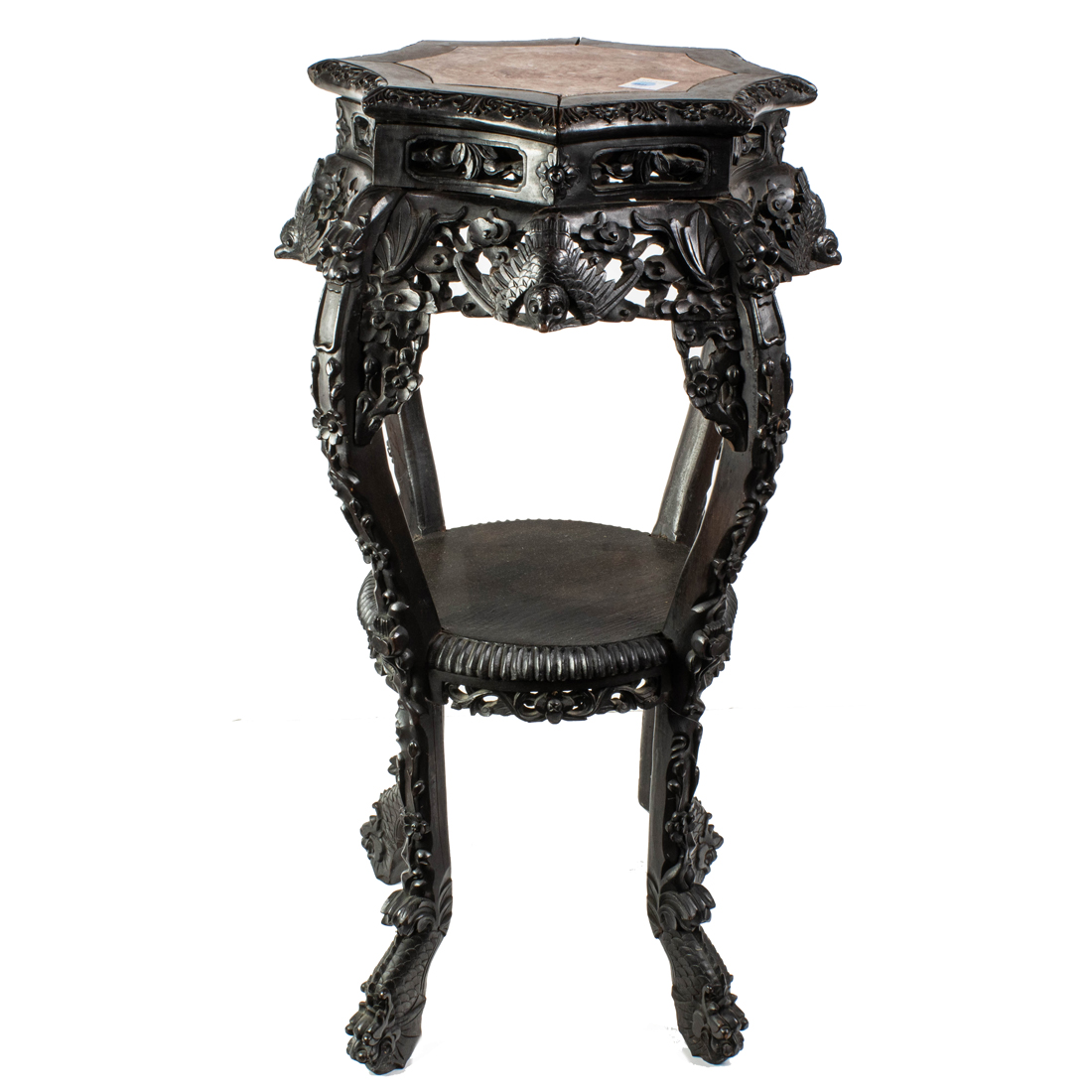 Appraisal: HARDWOOD OCTAGONAL STAND Hardwood octagonal stand carved in relief with