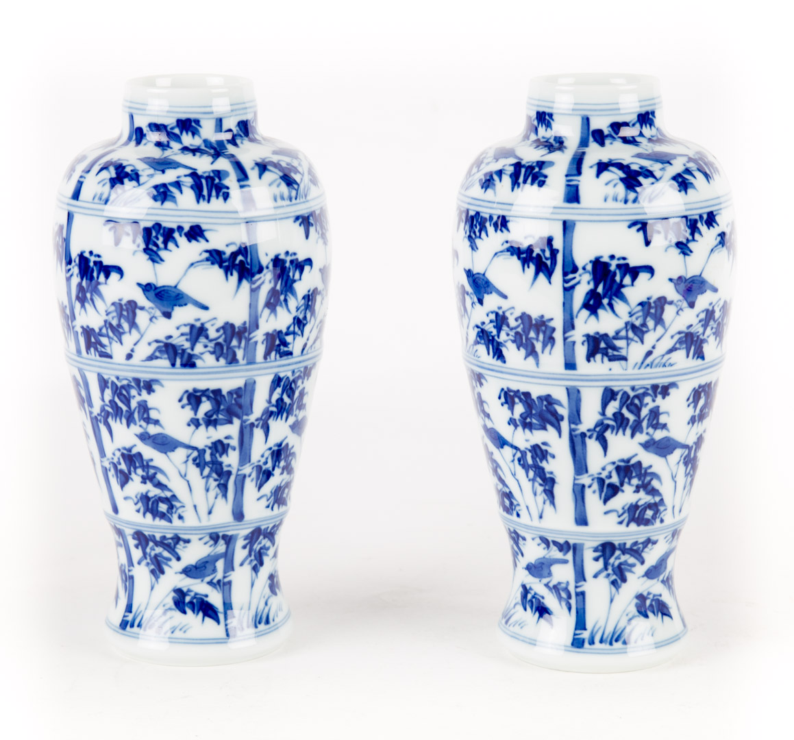 Appraisal: Pair of Mottahedeh porcelain jars blue and white bird and