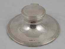 Appraisal: A silver capstan inkwell by Walker and Hall Sheffield Approx