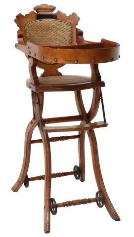 Appraisal: English Victorian oak child's highchair marked to back metamorphic design