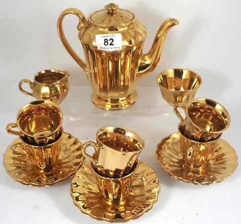 Appraisal: Wade Coffee Set in Rich Gold pattern Comprising Coffee Pot