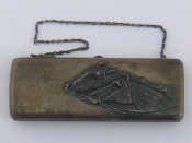 Appraisal: A Russian silver purse embossed with heads of horses racing