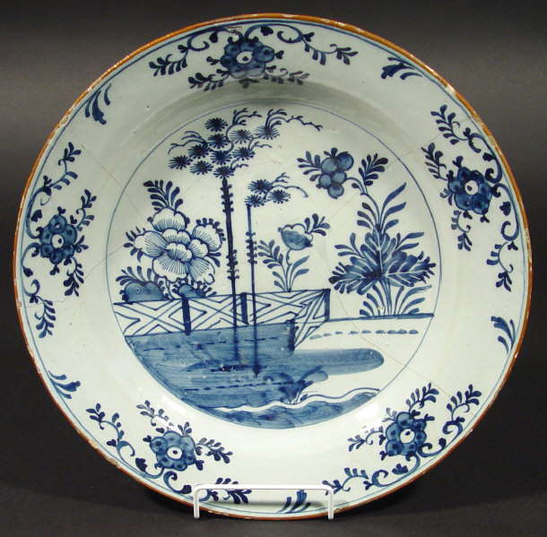 Appraisal: th Century Delft shallow bowl painted in blue with flowers