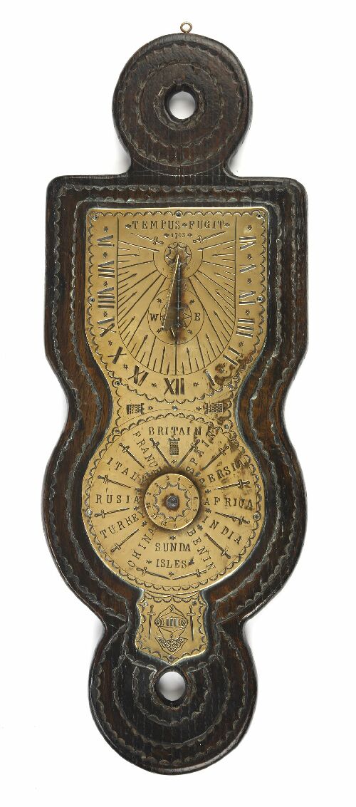 Appraisal: An oak and brass wall mounted sundial of early th