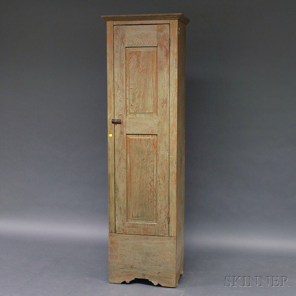 Appraisal: Gray-painted Chimney Cupboard America th century with molded cornice and