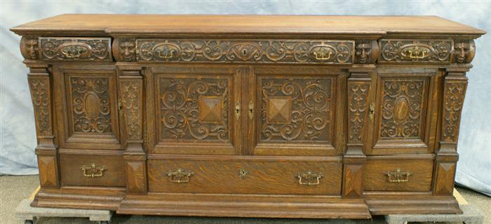 Appraisal: Carved oak sideboard w with a curio top that needs