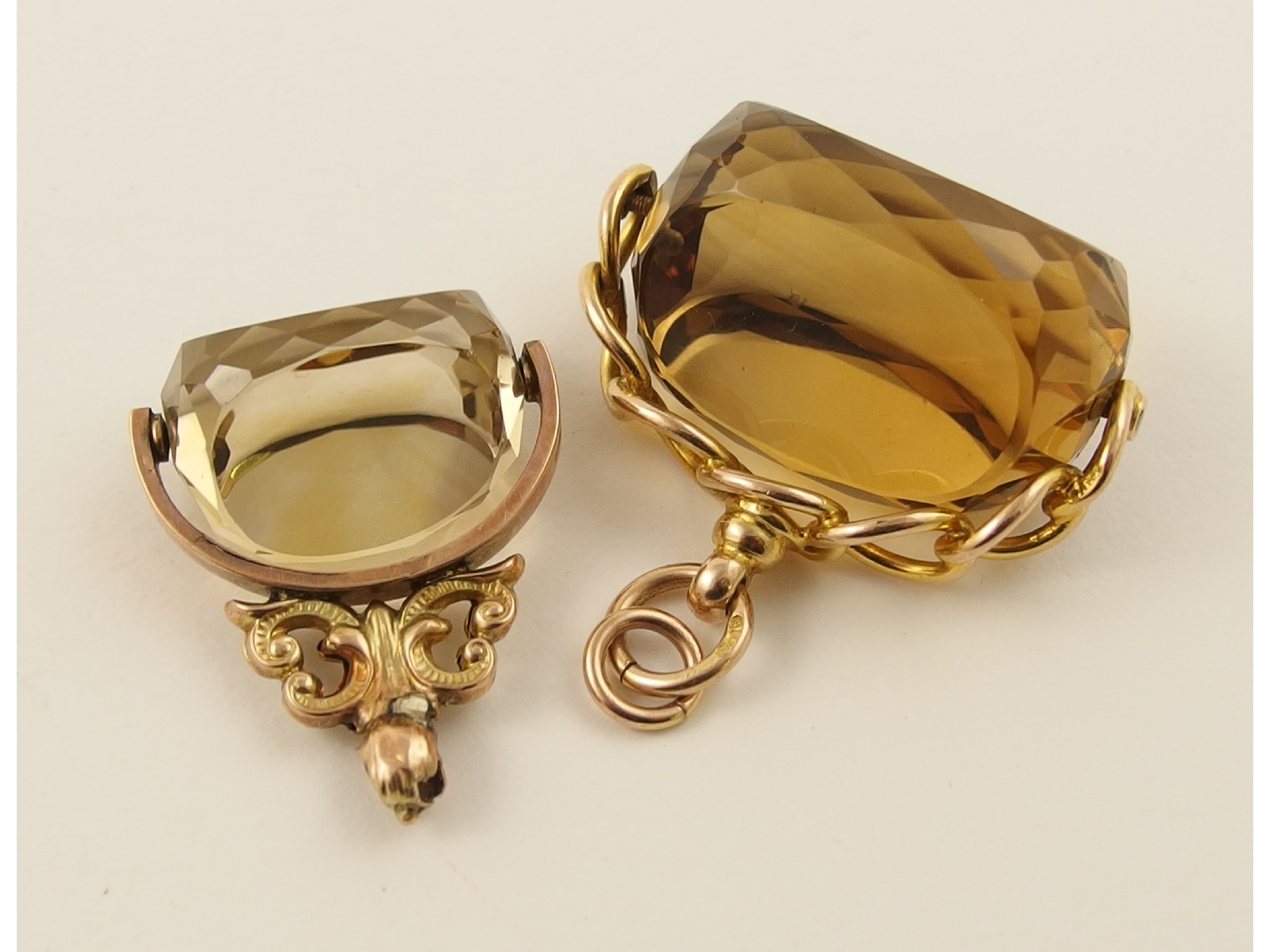 Appraisal: Two ct citrine swivel fobsapprox weight including citrines gms