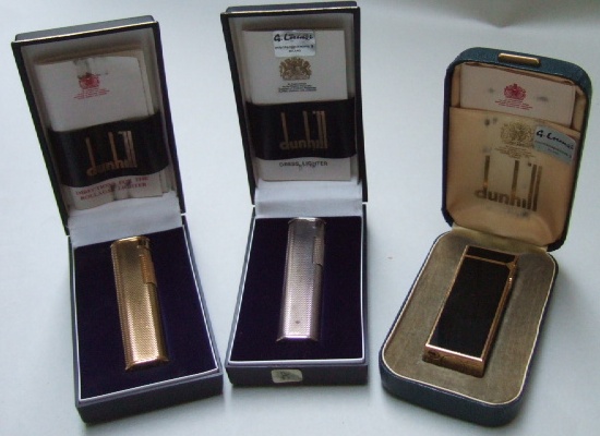 Appraisal: A gold plated Dunhill gas lighter with engine turned decoration