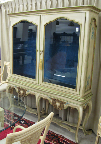 Appraisal: AN ITALIAN PROVINCIAL STYLE DISPLAY CABINET ON STAND Continental th