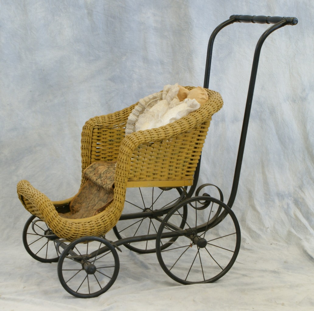 Appraisal: Wicker Doll Carriage steel wood frame and wheels high x