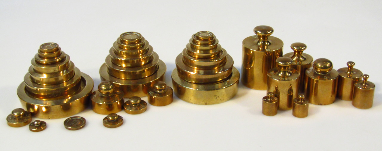 Appraisal: Three sets of early thC graduated brass weights from lb