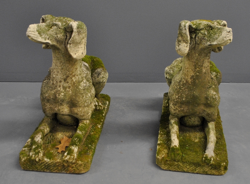 Appraisal: - Pair of cast stone recumbent whippets h x l