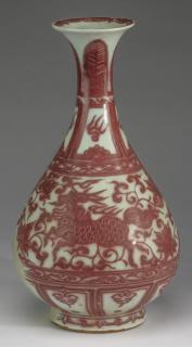 Appraisal: Chinese iron red qilin pear Chinese iron red pear-form vase