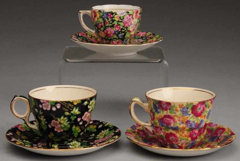 Appraisal: Lot of Floral Chintz Cup Saucer Sets One cup with