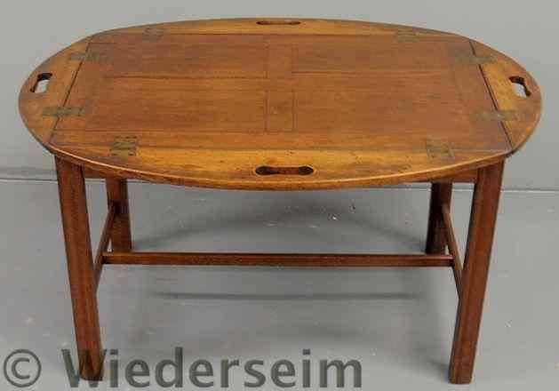 Appraisal: Chippendale style mahogany butler's tray table with square molded legs