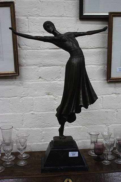 Appraisal: A CONTEMPORARY BRONZE SCULPTURE of an art deco style dancing