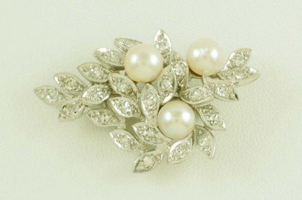 Appraisal: Pearl and diamond leaf brooch in approximately K white gold