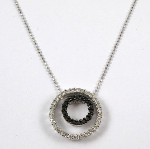 Appraisal: DIAMOND AND WHITE GOLD PENDANT NECKLACE the two round pendants