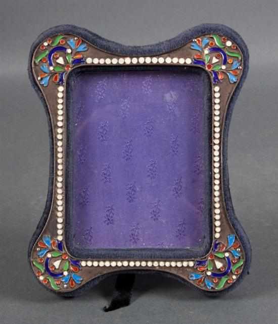 Appraisal: Russian cloisonne enamel on silver frame on a blue velvet-covered