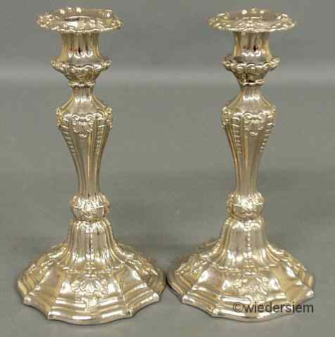 Appraisal: Pair of weighted sterling silver Chippendale style candlesticks with hallmarks