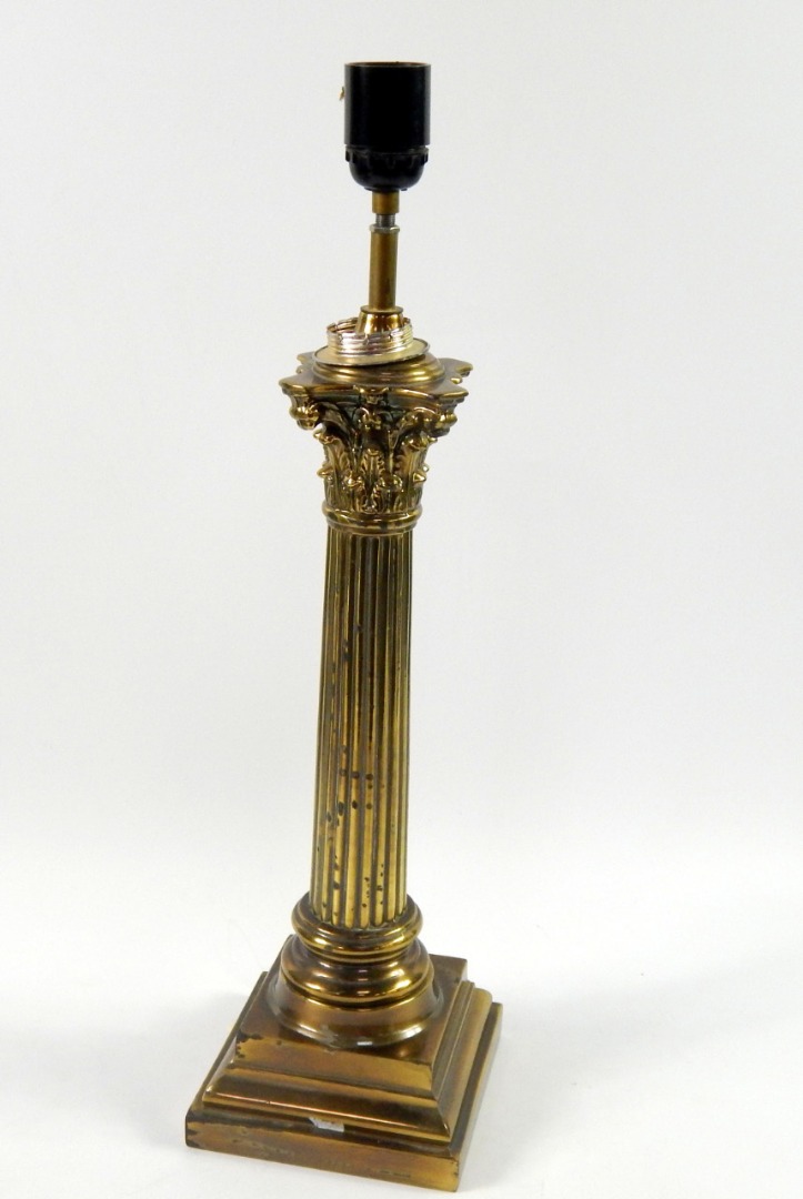 Appraisal: A brass Corinthian column table lamp raised on a stepped