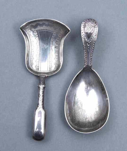 Appraisal: A GEORGE III SILVER CADDY SPOON with engraved shovel shaped