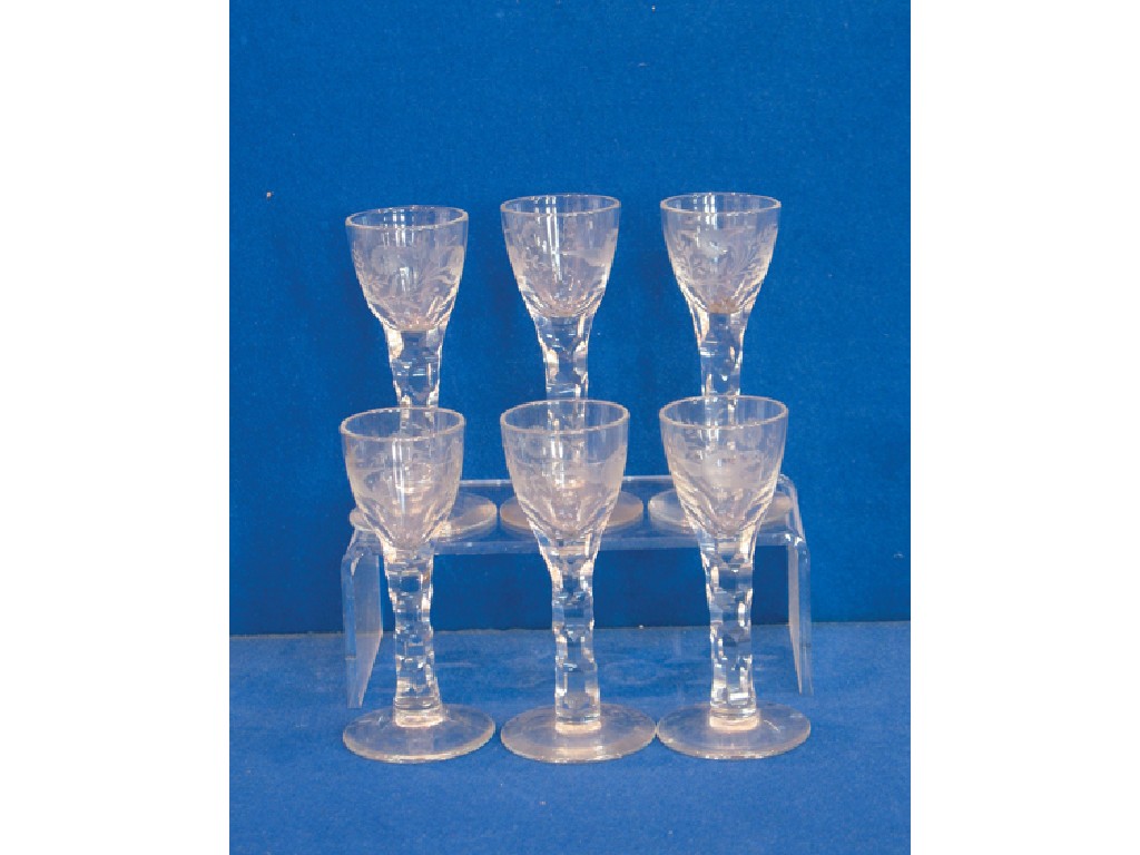 Appraisal: A SET OF SIX CLEAR GLASS WINE GLASSES the bowls