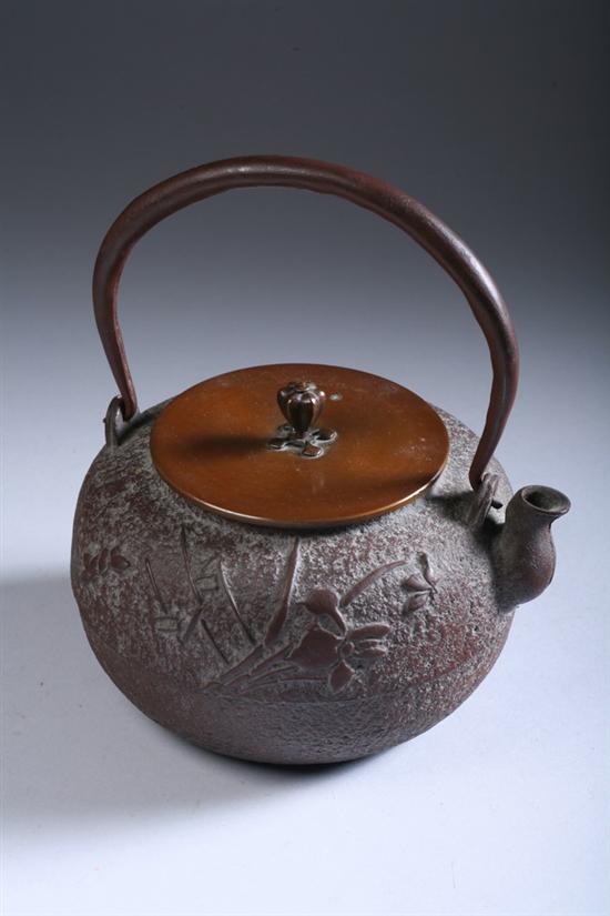 Appraisal: JAPANESE COPPER CAST IRON GLOBULAR TEAPOT Meiji period Signed on