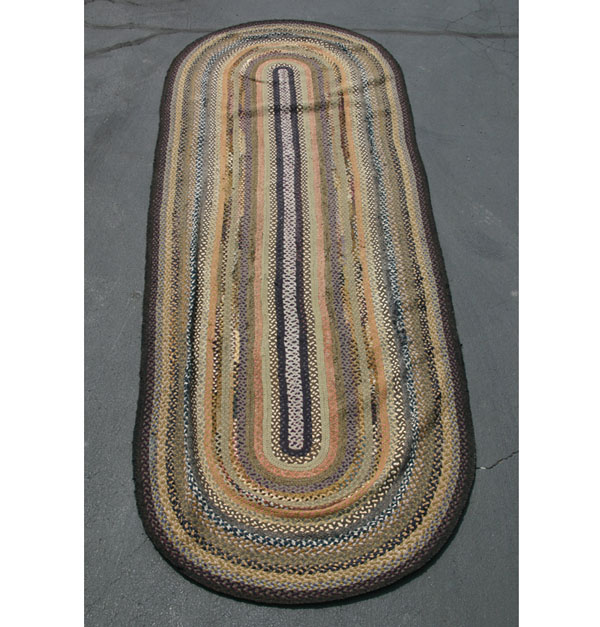 Appraisal: Large oval hand made rag rug large multi color Provenance