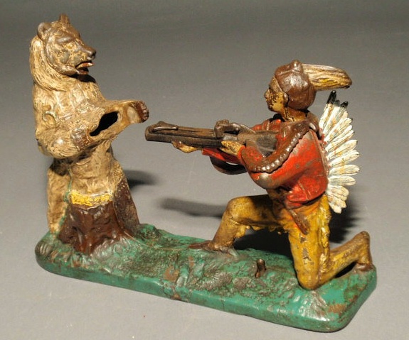 Appraisal: Cast iron mechanical bank c of an Indian shooting a