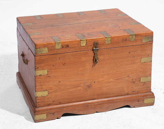 Appraisal: A TH CENTURY CAMPHOR OR TEAK TRAVELLING CHEST with brass