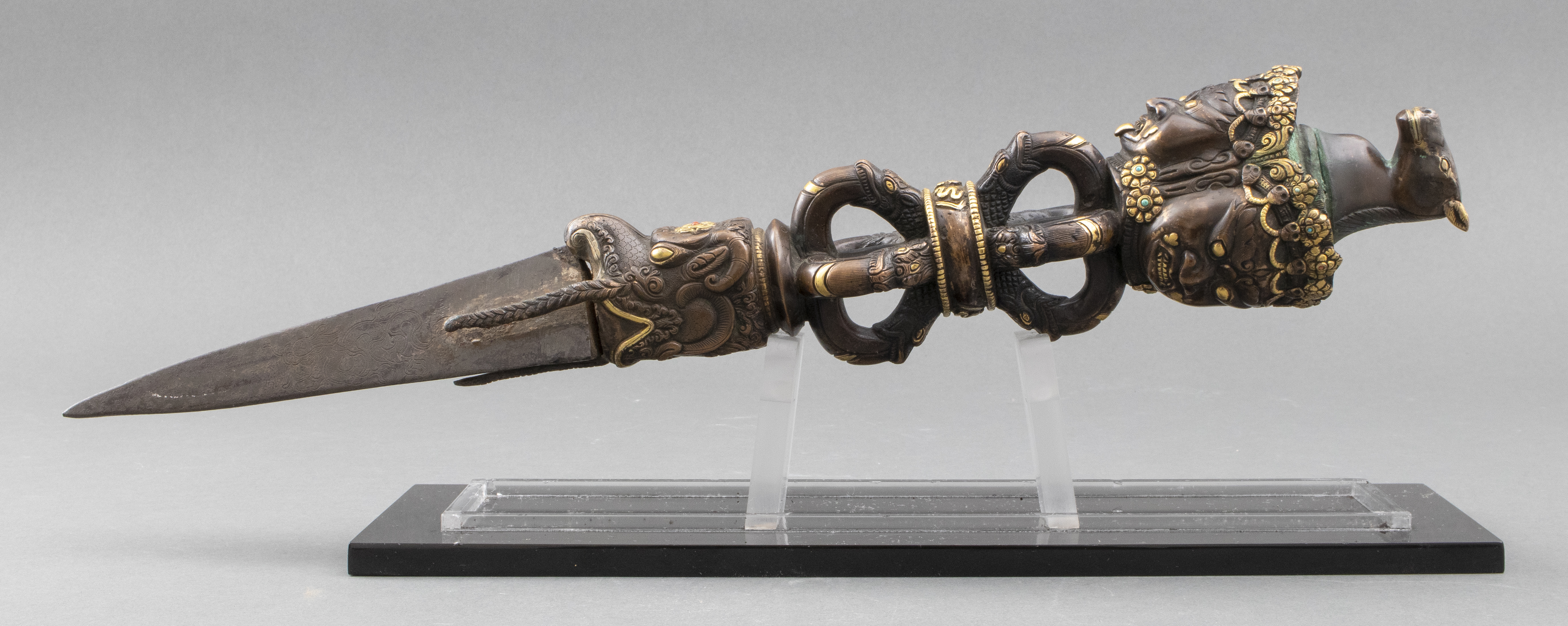 Appraisal: SINO-TIBETAN GILT BRONZE PHURBA CEREMONIAL DAGGER Sino-Tibetan gilt bronze ceremonial