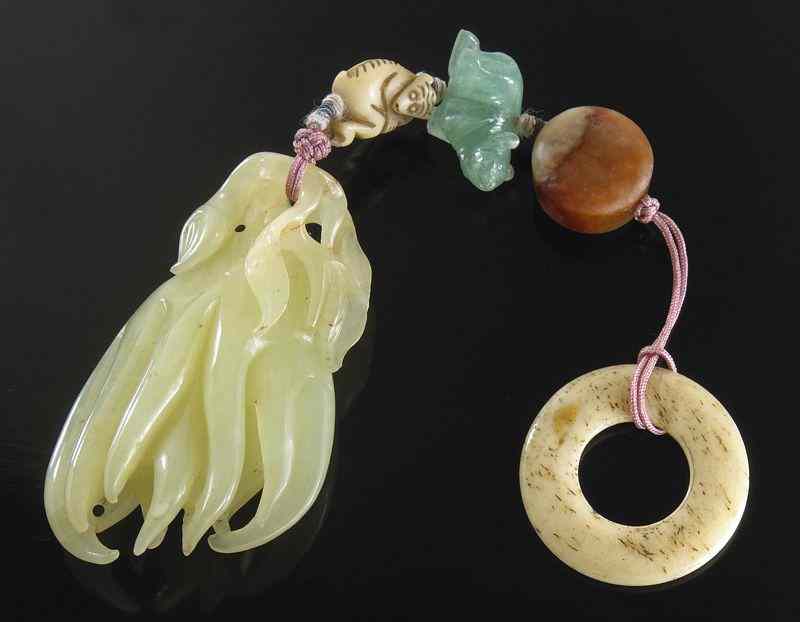 Appraisal: Chinese Qing carved yellow jade Buddha's handpendant Jade ''H Circa