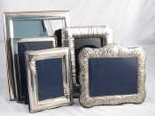 Appraisal: Five silver faced photo frames two strut backed each x