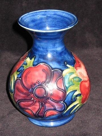 Appraisal: A Moorcroft 'Anemone' pattern pear shaped vase of deep blue