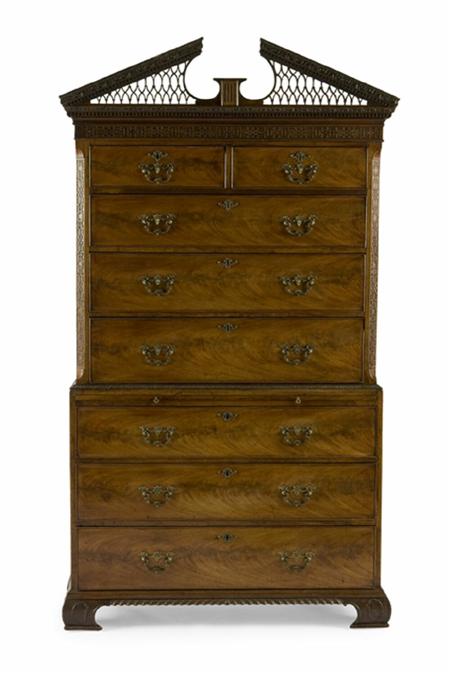 Appraisal: A George III mahogany chest-on-chest the broken arched triangular pediment