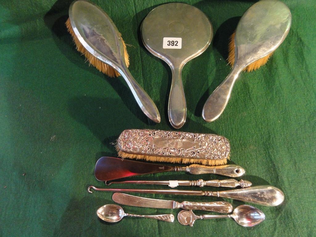 Appraisal: A mixed quantity of silverware comprising a hand mirror three