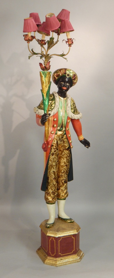 Appraisal: A Venetian style Blackamoor torchere with six gilt metal branches