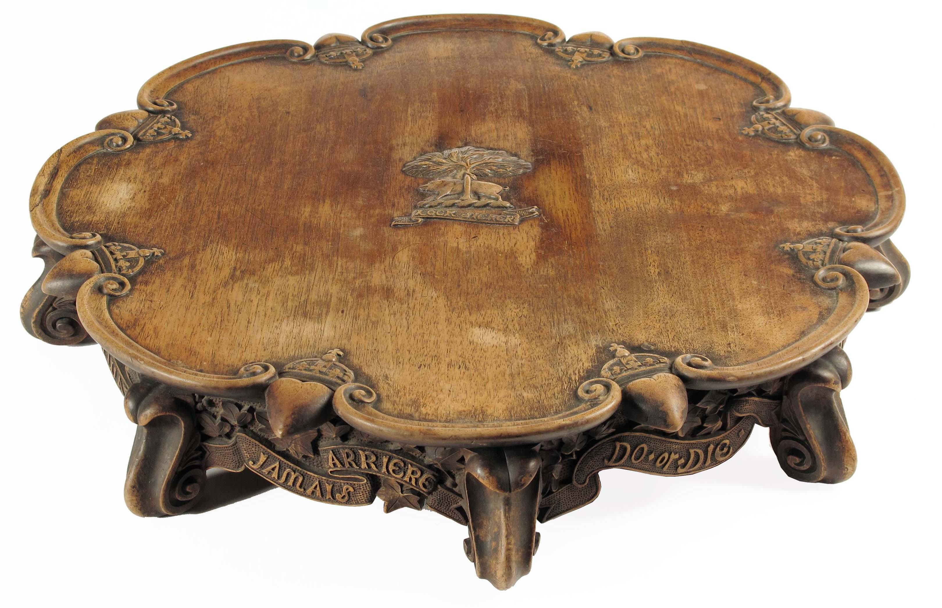 Appraisal: A Victorian carved walnut lazy susan