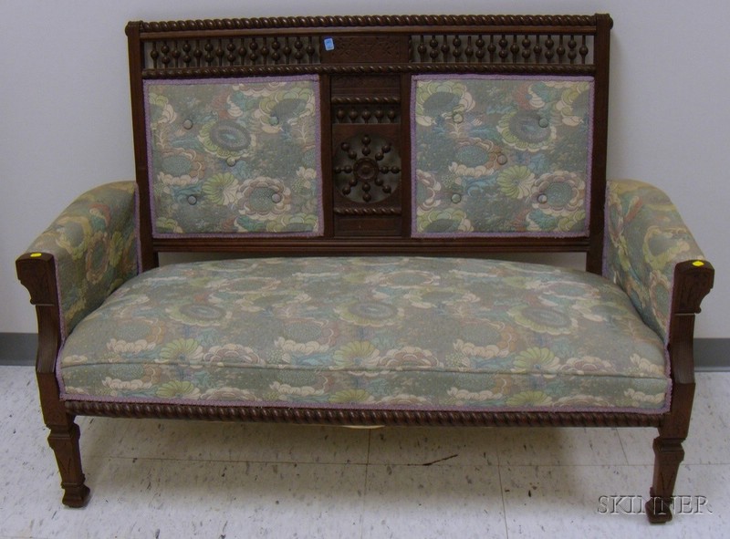 Appraisal: Late Victorian Upholstered Carved and Spool-turned Walnut Settee lg in