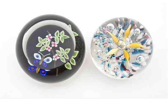 Appraisal: Two Glass Paperweights one having flower and butterfly decoration on