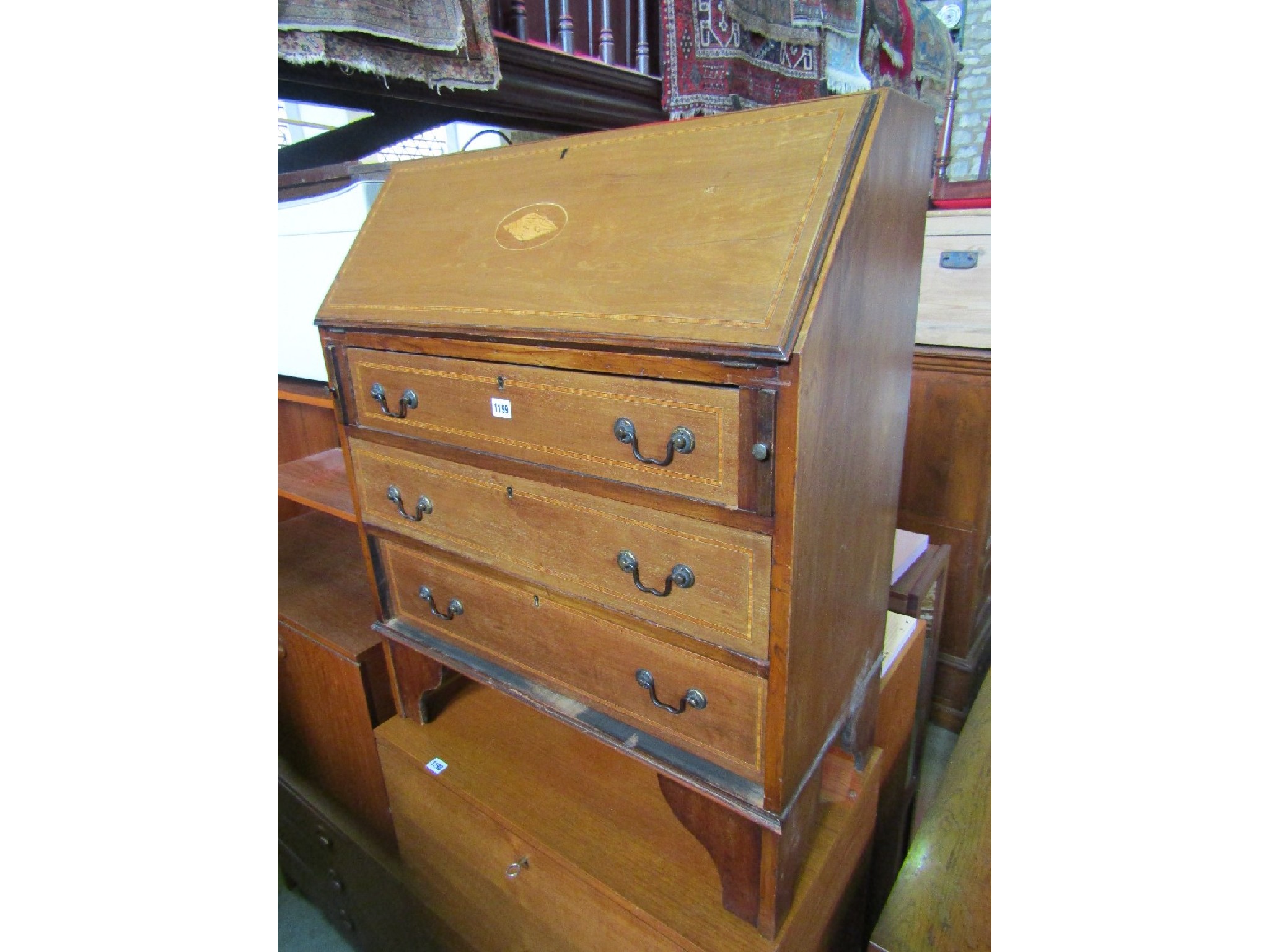 Appraisal: An inlaid Edwardian mahogany writing bureau with satinwood banding and