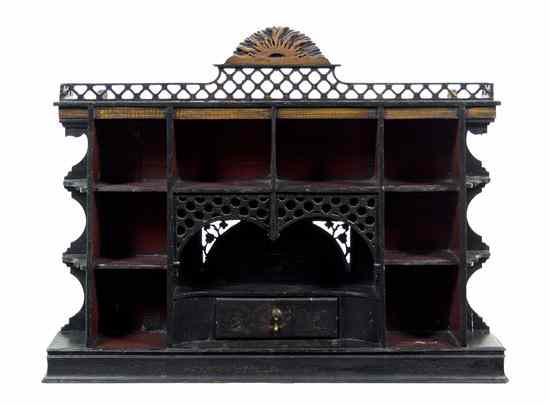 Appraisal: An English Lacquered Wall Shelf having a pierce carved fretwork