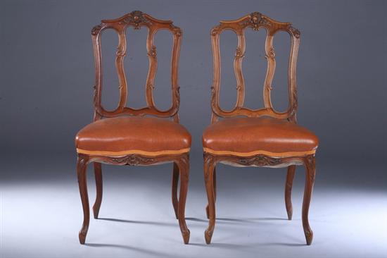 Appraisal: PAIR REGENCE STYLE CARVED WALNUT SIDE CHAIRS late th century