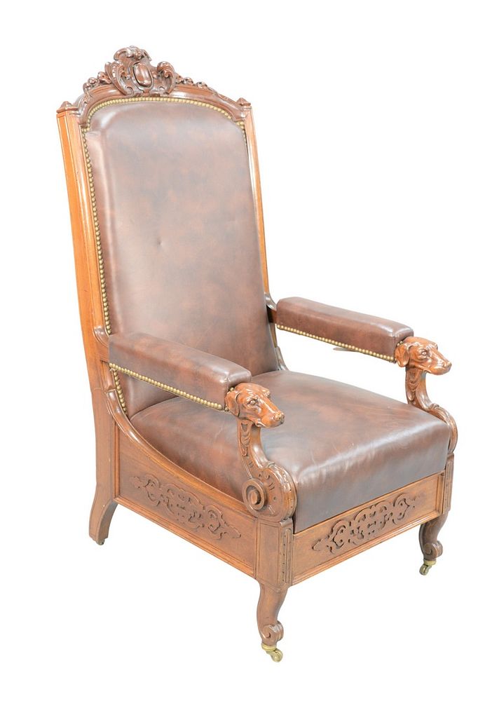 Appraisal: Victorian Walnut Reclining Chair with brown leather upholstery and carved