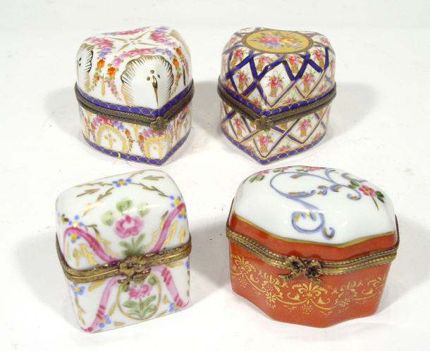 Appraisal: Four French porcelain boxes with hinged lids each containing a