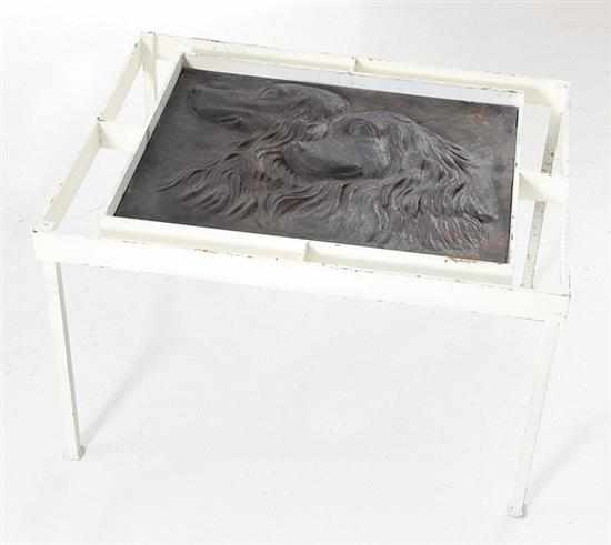 Appraisal: Painted cast-iron table rectangular top centering panel with two dogs